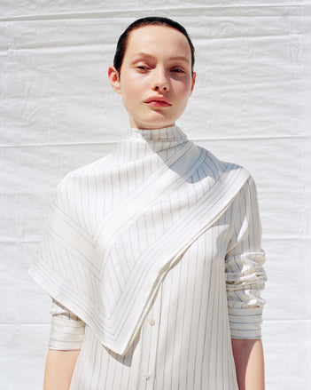 Cropped image of model wearing Hannah Dress in Stripe Silk Twill in ivory multi