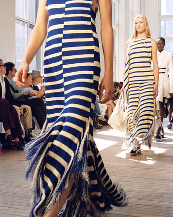 Models walking Proenza Schouler Spring Summer 2025 Runway wearing the Yves Dress in Stripe Fringed Knit and Yves Top and Skirt in Stripe Fringed Knit