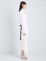 Proenza Schouler Full Length Side Image of model wearing Alia Top in Classic Cotton Shirting in White