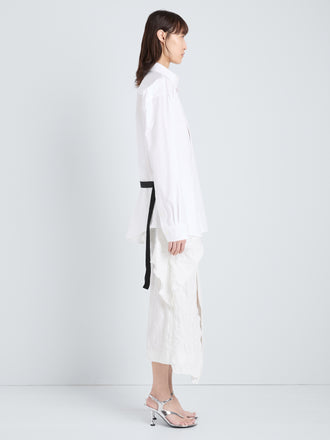 Proenza Schouler Full Length Side Image of model wearing Alia Top in Classic Cotton Shirting in White