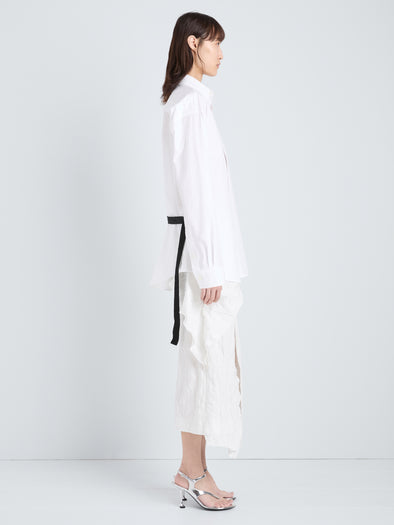 Proenza Schouler Full Length Side Image of model wearing Alia Top in Classic Cotton Shirting in White