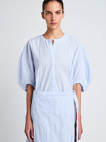 Proenza Schouler Detail image of model wearing Alicia Dress in Crinkled Cotton Gabardine in SKY BLUE