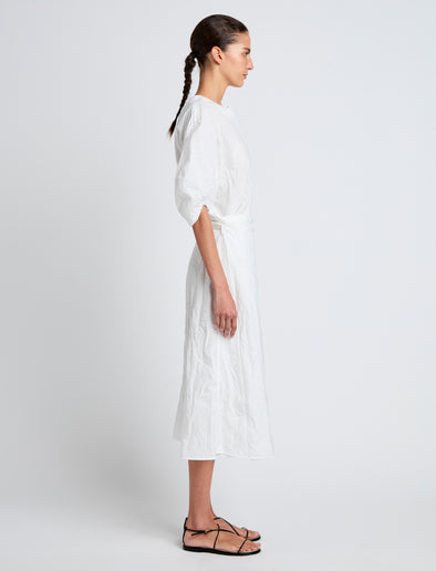Proenza Schouler Side full length image of model wearing Alicia Dress in Crinkled Cotton Gabardine in WHITE