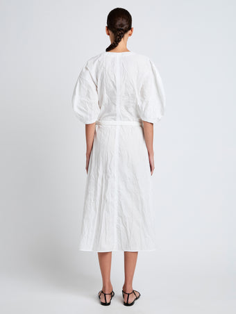 Proenza Schouler Back full length image of model wearing Alicia Dress in Crinkled Cotton Gabardine in WHITE