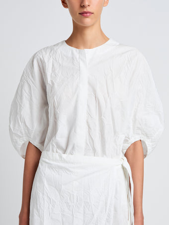 Proenza Schouler Detail image of model wearing Alicia Dress in Crinkled Cotton Gabardine in WHITE