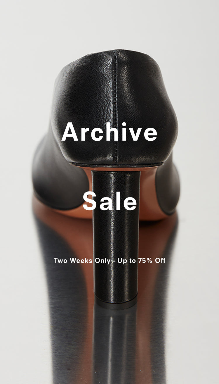Back image of black heel on silver background, 'Archive Sale, Two Weeks Only - Up to 75% Off' overlaid