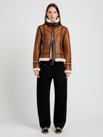 Proenza Schouler Front image of model wearing Arlo Jacket in Leather Back Shearling in umber