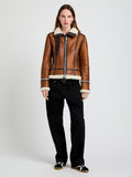 Proenza Schouler Front image of model wearing Arlo Jacket in Leather Back Shearling in umber