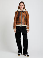 Proenza Schouler Front image of model wearing Arlo Jacket in Leather Back Shearling in umber