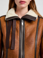 Proenza Schouler Detail image of model wearing Arlo Jacket in Leather Back Shearling in umber