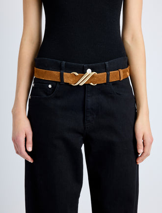 Cropped image of model wearing Monogram Belt in Suede in saddle