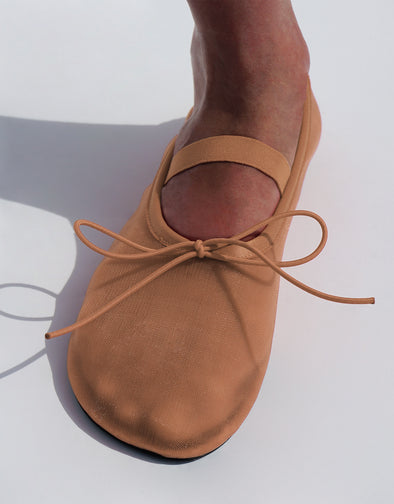 Image of model wearing Glove Mary Jane Ballet Flats in Satin in terracotta