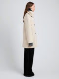 Proenza Schouler Side full length image of model wearing Brisa Coat in Lightweight Double Face Wool in Off White