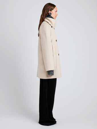 Proenza Schouler Side full length image of model wearing Brisa Coat in Lightweight Double Face Wool in Off White