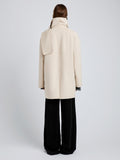 Proenza Schouler Back full length image of model wearing Brisa Coat in Lightweight Double Face Wool in Off White