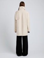 Proenza Schouler Back full length image of model wearing Brisa Coat in Lightweight Double Face Wool in Off White