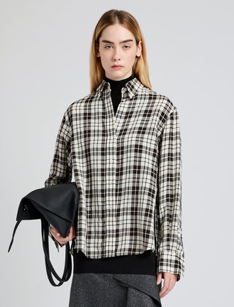 Proenza Schouler front cropped image of model wearing Bronwen Top in Crinkled Plaid in garnet multi