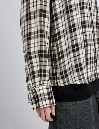 Proenza Schouler detail image of model wearing Bronwen Top in Crinkled Plaid in garnet multi