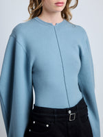 Proenza Schouler Detail image of model wearing Carolina Sweater in Souffle Knit in LARK BLUE