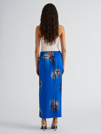 Proenza Schouler Full Length Back image of model wearing the Cella Skirt in Double printed Viscose Cady in Cerulean