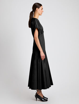Proenza Schouler side image of model wearing Ciara Dress in Eco Compact Poplin in black