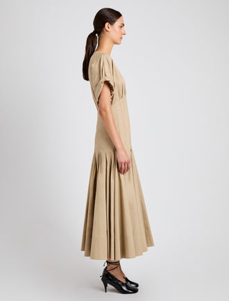 Proenza Schouler side image of model wearing Ciara Dress in Eco Compact Poplin in khaki