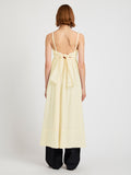Proenza Schouler Back full length image of model wearing Claudine Dress in Tech Poplin in Light Butter