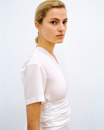 Cropped image of model wearing Sidney Dress in Silk Viscose in off white