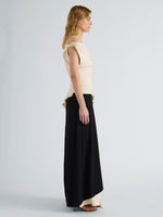 Proenza Schouler Side Full length image of model wearing the Daliah Dress in Satin Back Crepe in Ecru Black