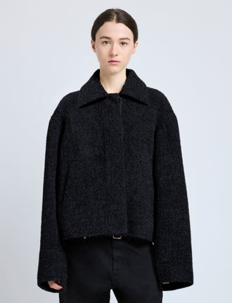 Cropped front image of model wearing Darcy Jacket in Brushed Wool Cashmere in black
