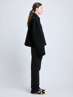 Side image of model wearing Darcy Jacket in Brushed Wool Cashmere in black