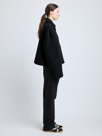 Side image of model wearing Darcy Jacket in Brushed Wool Cashmere in black