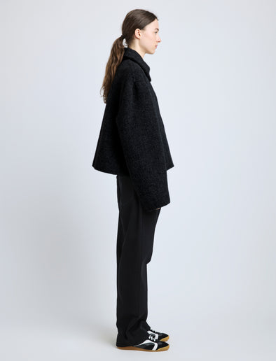 Side image of model wearing Darcy Jacket in Brushed Wool Cashmere in black