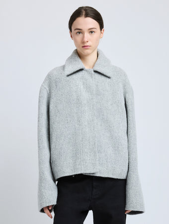 Cropped front image of model wearing Darcy Jacket in Brushed Wool Cashmere in light grey melange