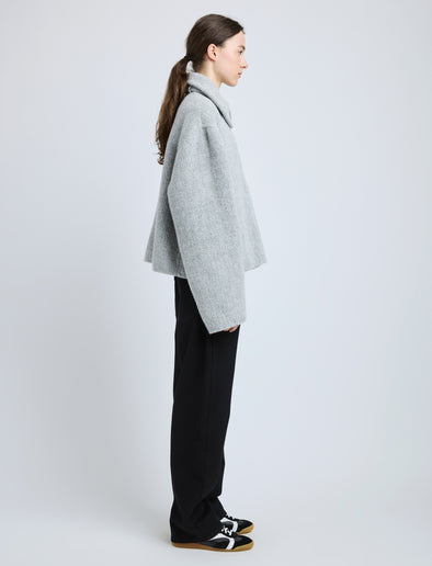 Side image of model wearing Darcy Jacket in Brushed Wool Cashmere in light grey melange