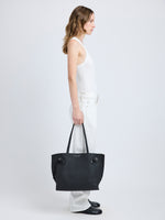 Image of model wearing Days Tote in Pebbled Calf Skin in BLACK