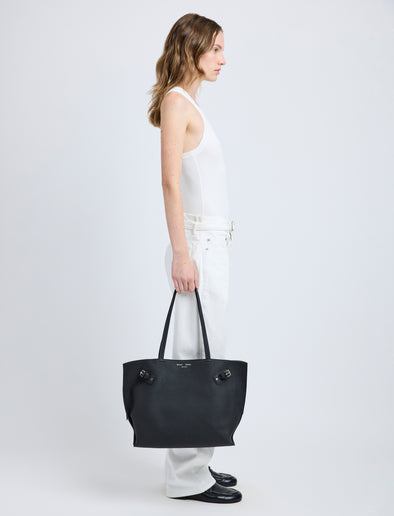 Image of model wearing Days Tote in Pebbled Calf Skin in BLACK
