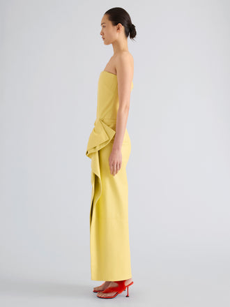 Proenza Schouler Full length side image of model wearing Alonna Dress in Leather in Pale Yellow