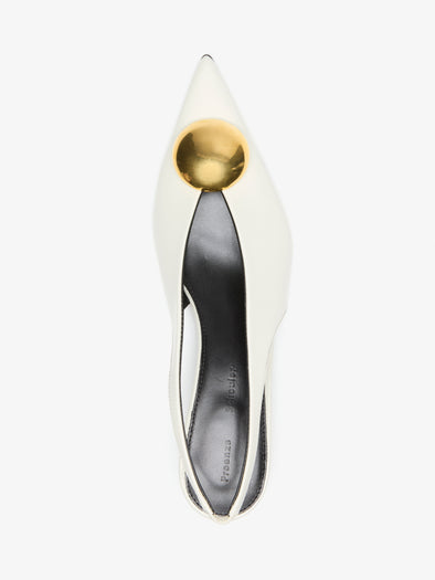 Proenza Schouler Aerial Still Life Image of Dome Slash Slingbacks in Polished Calf in Ivory