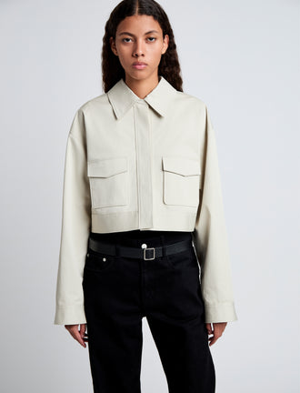 Detail image of model wearing Dylan Jacket in Organic Cotton Twill in wheat