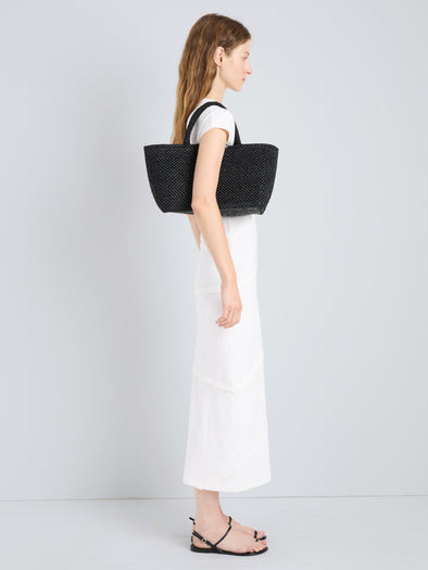 Proenza Schouler Still Life Front Image of Model Wearing East West Chelsea Tote in Raffia in Black