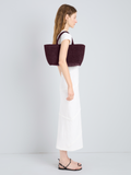 Proenza Schouler Image of model wearing East West Chelsea Tote in Raffia in Plum