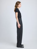 Proenza Schouler Side full length image of model wearing Eleanor Pant in Grid Flannel in CARBON MELANGE