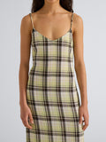 Proenza Schouler detail image of model wearing the Evelyn Dress in Plaid Gauze in straw multi 