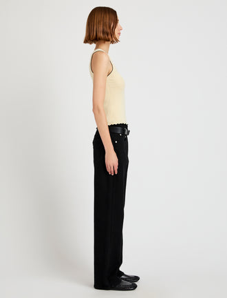 Proenza Schouler Side full length image of model wearing Eloise Knit Top in Lightweight Cotton in Light Butter