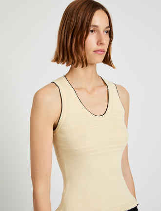 Proenza Schouler Detail image of model wearing Eloise Knit Top in lightweight Cotton in Light Butter