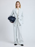 Proenza Schouler Front full length image of model wearing the Eva Jacket in Cotton Viscose Suiting in Pale Grey