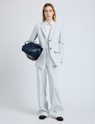 Proenza Schouler Front full length image of model wearing the Eva Jacket in Cotton Viscose Suiting in Pale Grey
