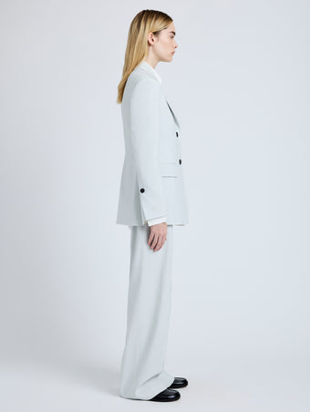 Proenza Schouler Side full length image of model wearing Eva Jacket in Cotton Viscose Suiting in Pale Grey
