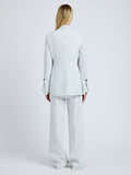 Proenza Schouler Back full length image of model wearing the Eva Jacket in Cotton Viscose Suiting in Pale Grey